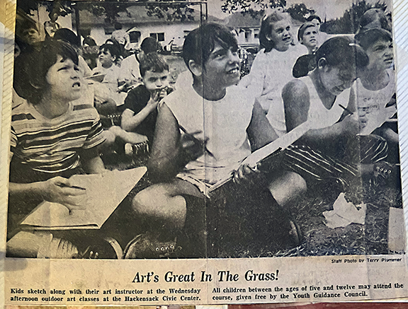 Newspaper picture showing children at the Civic Center camp